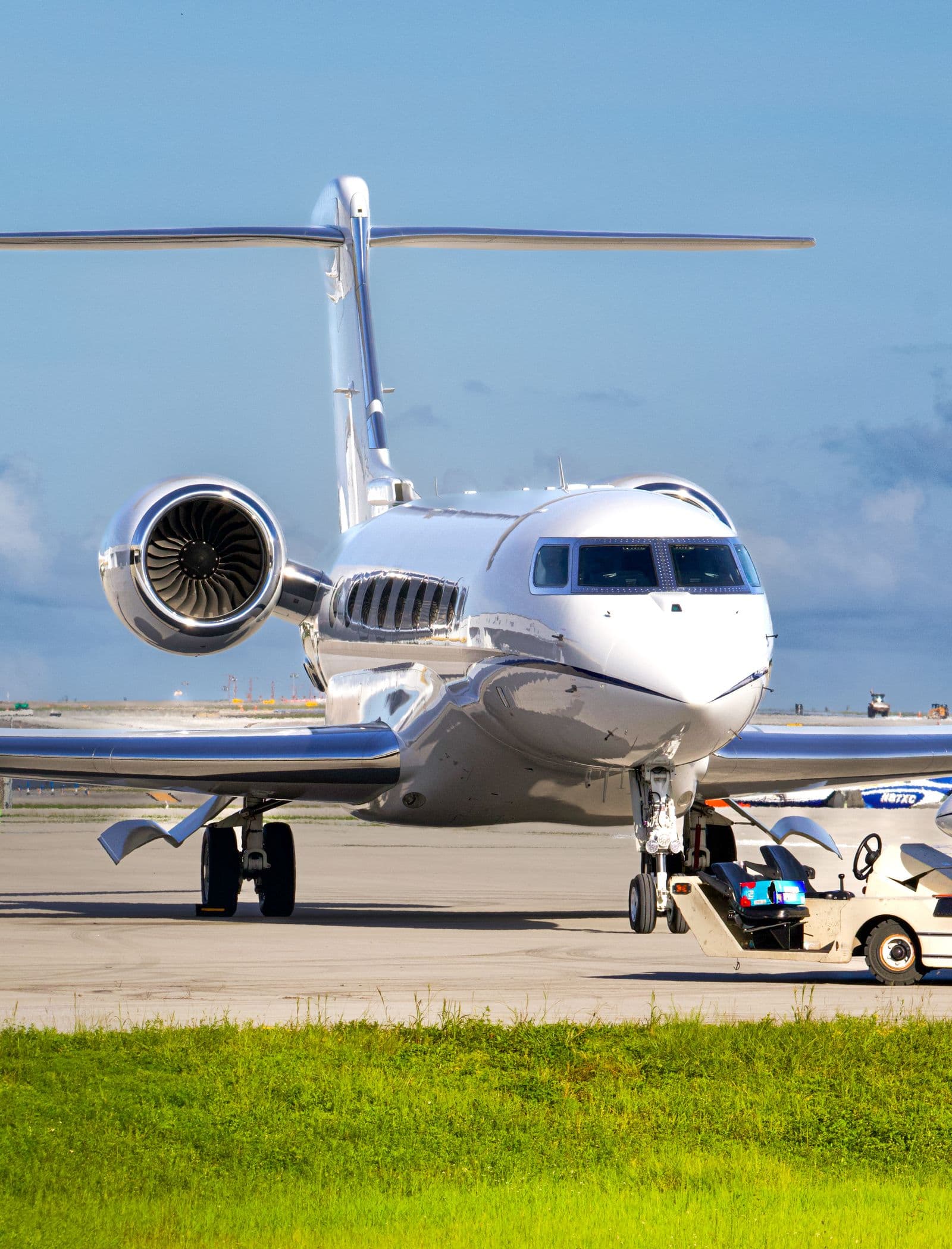Business jet on the tarmac, representing private flight and jet charter.